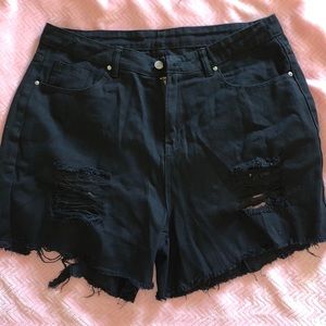 Black ripped shorts